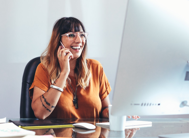 Travel services - businesswoman talking on cell phone